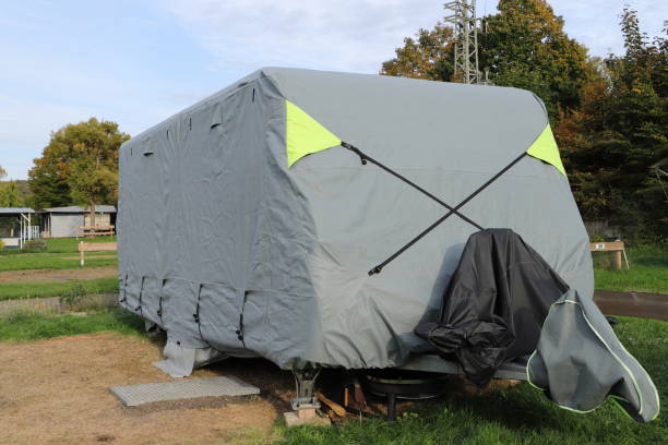 istock a caravan with a gray tarpaulin 1438897892