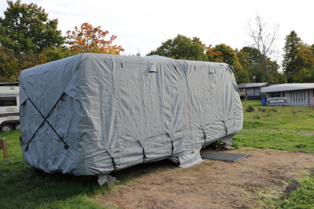 istock a caravan with a gray tarpaulin 1438897893