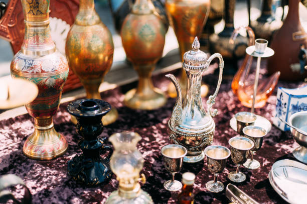 istock Metal Oriental Jug With Engraved Texture Floral Pattern. Oriental Style Ancient Jug At Flea Market. East Tableware. Old Tableware For Cofe And Tea 1438898138