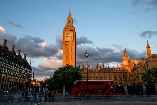 London, United Kingdom – July 06, 2022: Beautiful view of Big Ben and Palace of Westminster at sunset, London, UK