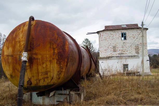 istock An old railway cistern and an old building 1438905753