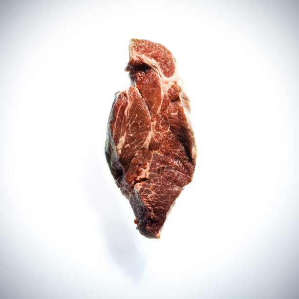 istock Piece of raw meat against a white background 1438905953