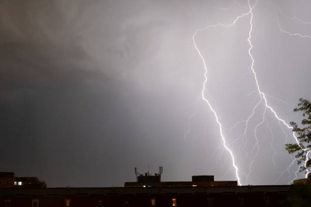 istock Beautiful scenery of lightning in the dark stormy sky - great for background or wallpaper 1438906708