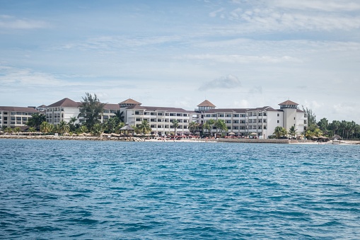 A view from the blue sea of resort buildings at Montego Bay, Jamaica