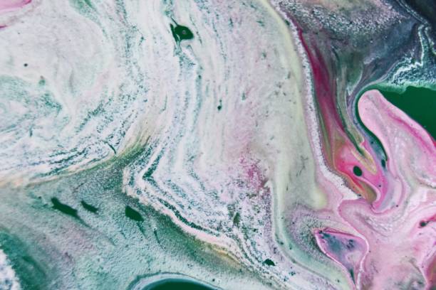 istock Patterns in the water with colorful mixed paints 1438909133