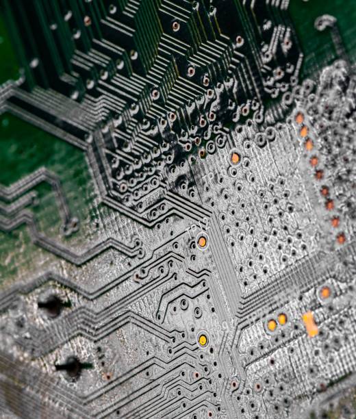 istock Macro Close up of printed wiring on PC circuit board 1438909170