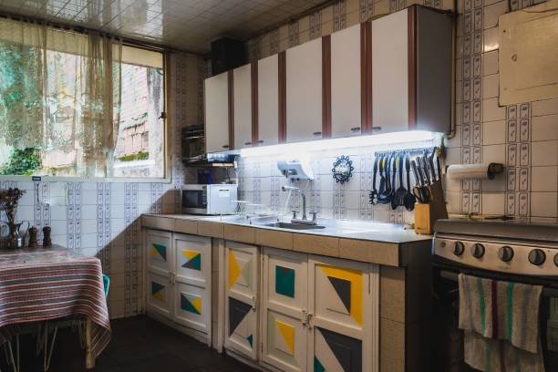 istock Well lit kitchen counter with sink in a classic home 1438909234