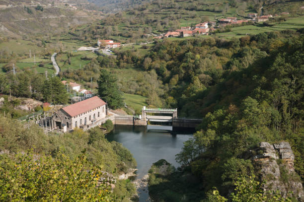 istock Small hydroelectric station in a beautiful green valley 1438912975