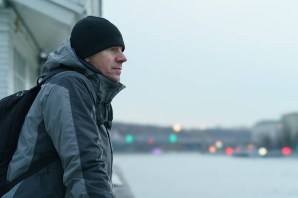 istock Potrait of handsome man outdoors when he is cold 1438914055