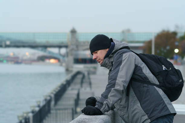 istock Potrait of handsome man outdoors when he is cold 1438914061