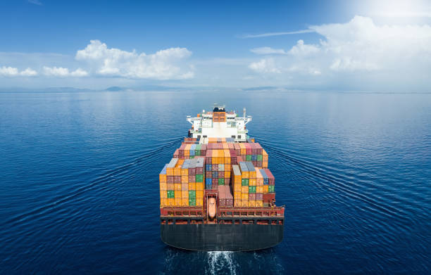 istock Aerial back view of a large container cargo carrier ship 1438915461