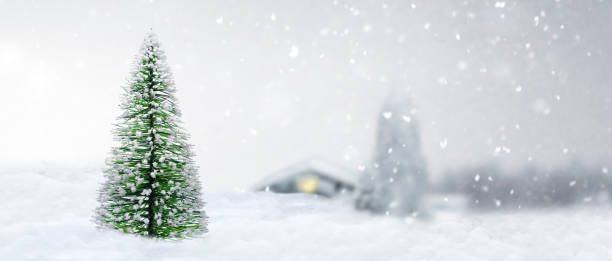 istock Christmas tree in snow landscape during snowfall 1438916361