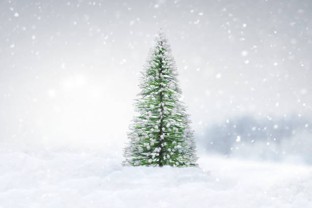 istock Christmas tree in snow landscape during snowfall 1438916375