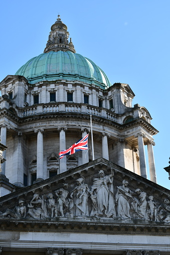 Belfast City Hall with the flag at half-staff for the death of Queen Elizibeth the second