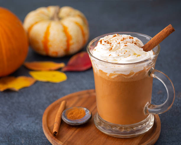 istock Pumpkin spice latte topped with whipped cream and cinnamon 1438916590