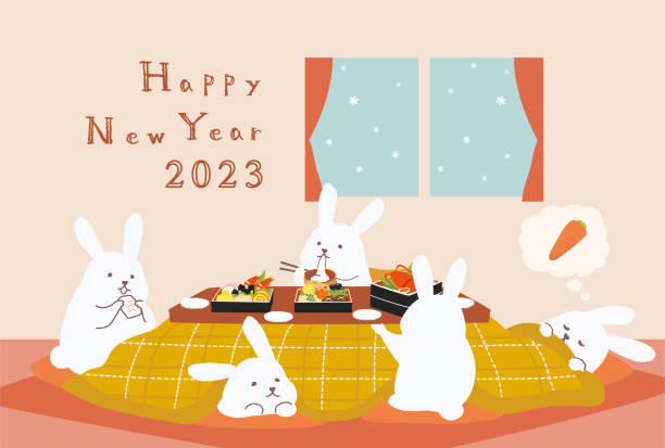 ilustraciones, imágenes clip art, dibujos animados e iconos de stock de tarjeta de año nuevo de un conejo comiendo comida de año nuevo con un kotatsu - lagomorfos