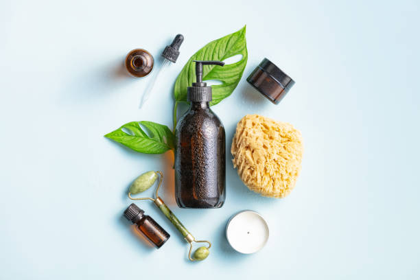 istock Natural skin care products on blue background, flat lay. 1438917841