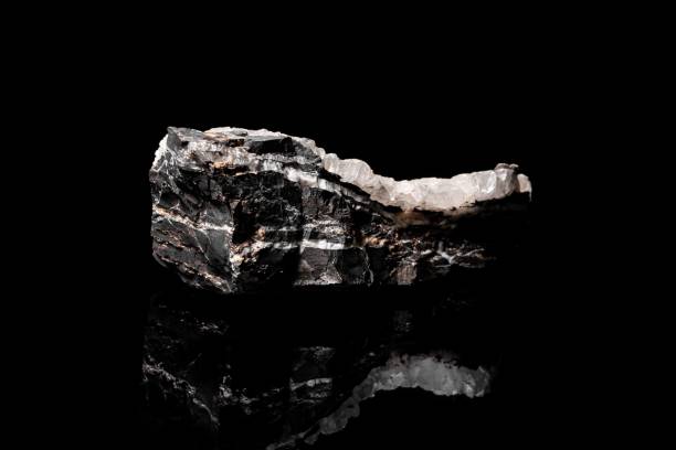 istock Macro Close up image of raw material Manganese Ore rock isolated 1438921608