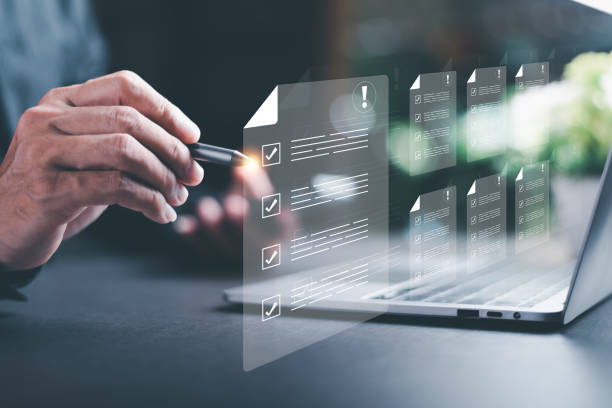 istock Businessman checking the steps through a virtual online document with a list of checkboxes Concepts of practices and policies, company articles of association Terms and Conditions 1438927361