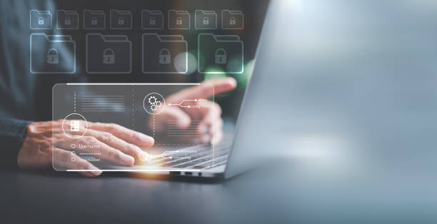 istock Businessman showing login icon to manage files,documents,online documentation database and process automation to efficiently manage files,cybersecurity concept on internet,authorizing secure logins 1438927365