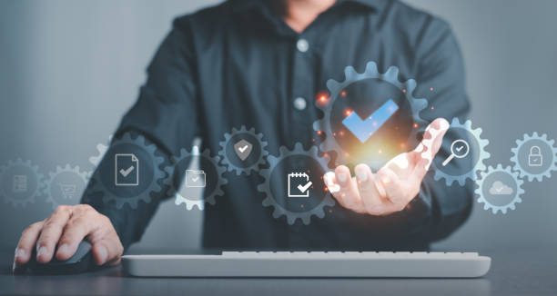 istock Businessman showing a validation icon, a quality check approval process concept, and a validation mark, a check mark symbol represents an international standard acceptance. 1438927366