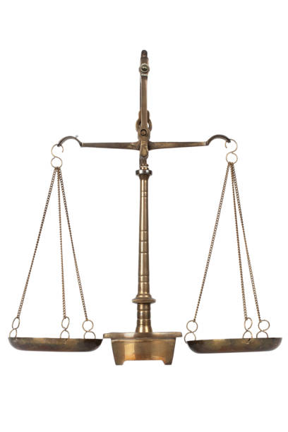 istock Bronze traditional balance scale isolated on white background. 1438927564