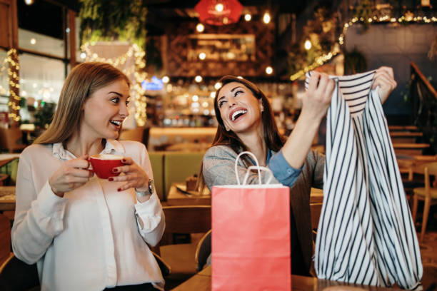 istock Two best friends in coffee bar 1438927632