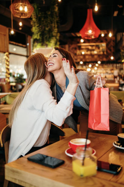 istock Two best friends in coffee bar 1438927651