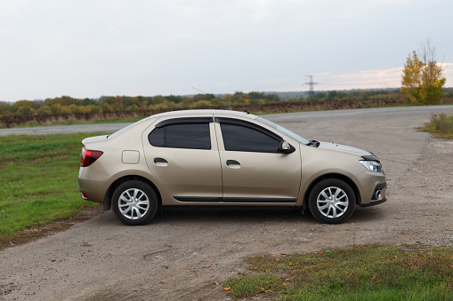 Chiangmai, Thailand - June 21 2018: Private Eco city Car Suzuki Swift. Photo at road no.121 about 8 km from downtown Chiangmai, thailand.