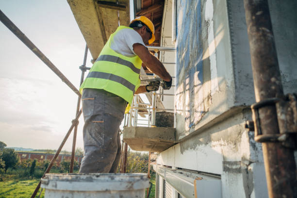 istock A construction worker builds the facade of a building 1438932231