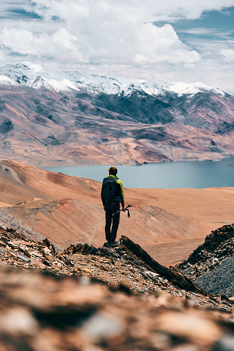 Leh, India, August 18th, 2022: Man looking at view on the mountains of the Ladakh Region