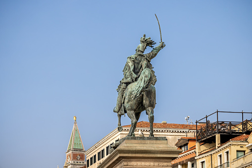 Reus/Spain; May 23 2015: Prim Square, with General Joan Prim equestrian statue, and Fortuny Theatre background, Reus, Spain