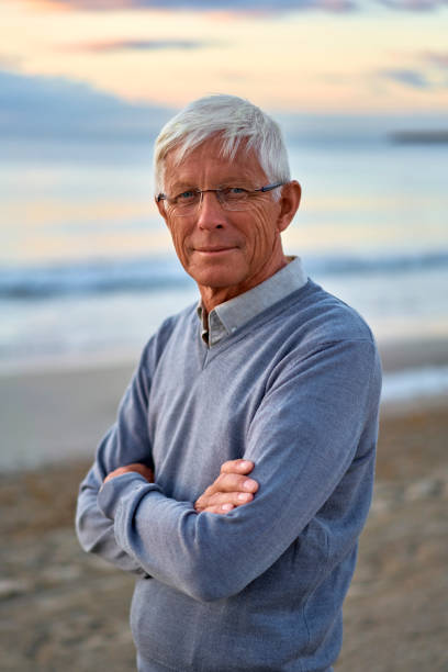 istock Senior couple on the beach 1438937443