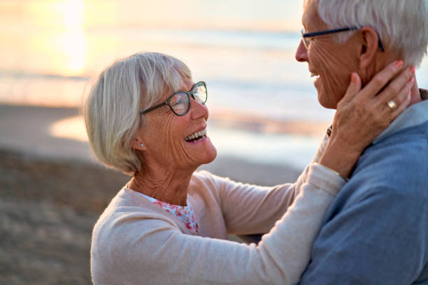 istock Senior couple on the beach 1438937498