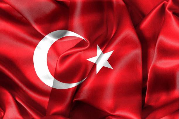 istock Flag of Turkey with realistic waving fabric effect. 1438937985