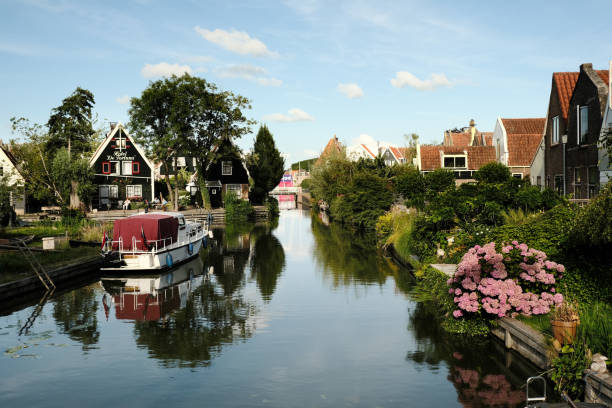 istock Typical Dutch rural houses by the canal. 1438938545