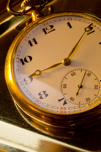 Classic gold pocket watch.