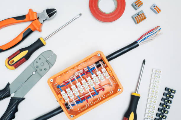 istock Top view of electrical components, equipment and tools. Repair electric box. 1438948651