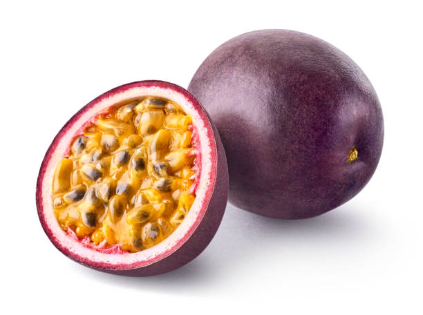 istock Whole and half passion fruit isolated on white background 1438956363