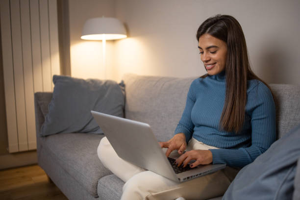 istock Young woman working from home 1438958371