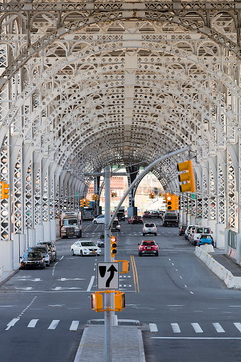 Traffic under Riverside Viaduct, Harlem, Upper Manhattan, New York City, America, USA.