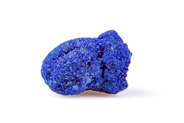 Uncut Blue Azurite or Chessylite Mineral Stone Uncut Royal Blue Azurite or Chessylite Mineral Stone Isolated on White Background crystalline inclusion complex stock pictures, royalty-free photos & images