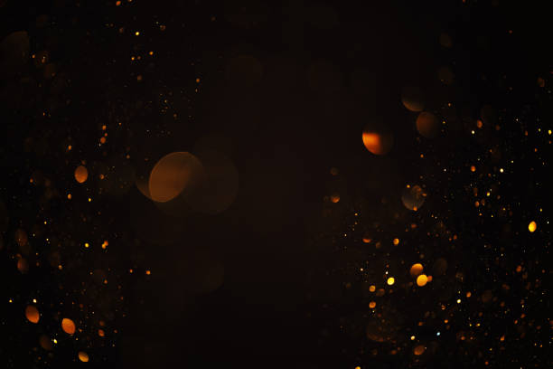 istock Gold swirly bokeh lights overlay 1438964288