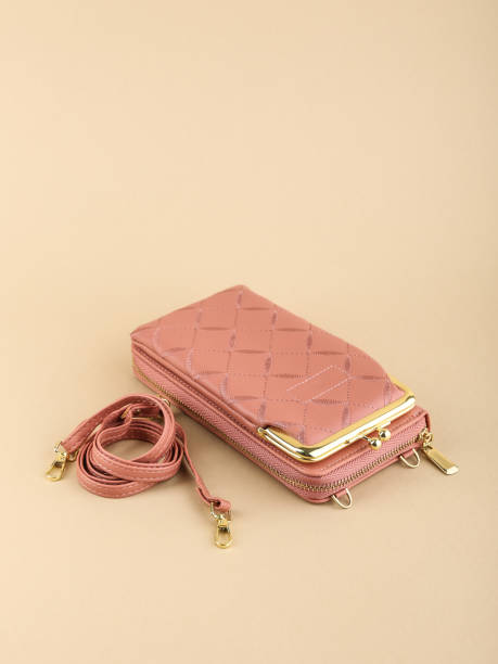 istock women purse on a light background 1438966230