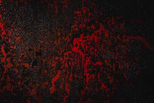 A digital illustration of abstract red patterns on a black background