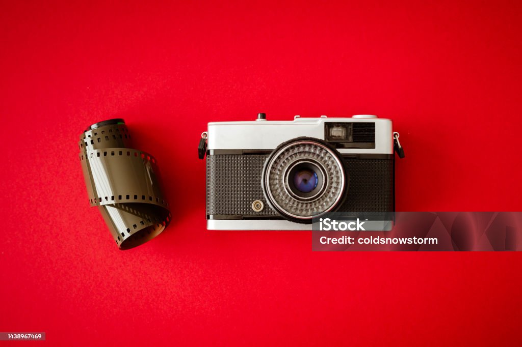 Vintage Film Camera On Red Background Stock Photo - Download Image