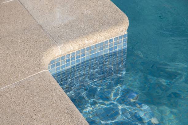 istock Edge of a clear water pool, summer time concept 1438967558