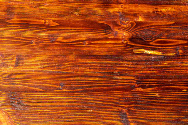 Dark textured wooden background, surface of old brown wood texture