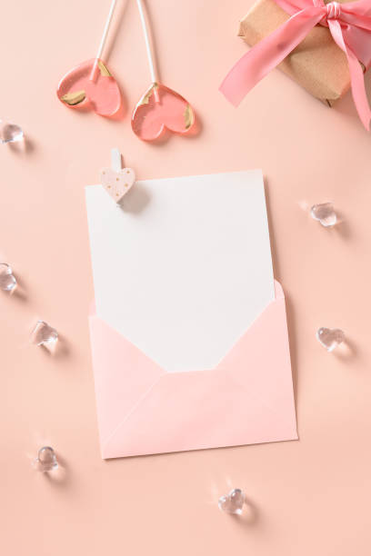 istock Valentine's day greeting card with empty blank and two pink sweets. 1438971822