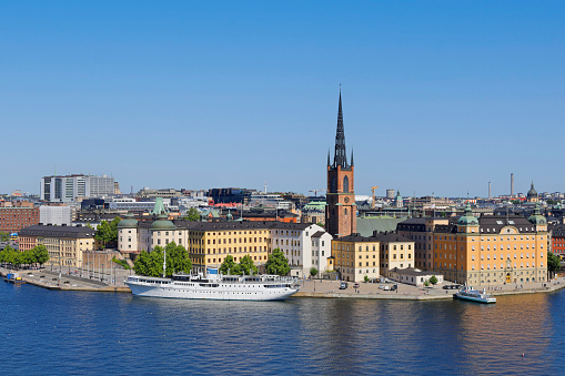 daytime view of the Stockholm skyline featuring Gamla stan, and Riddarholmen (Sweden).